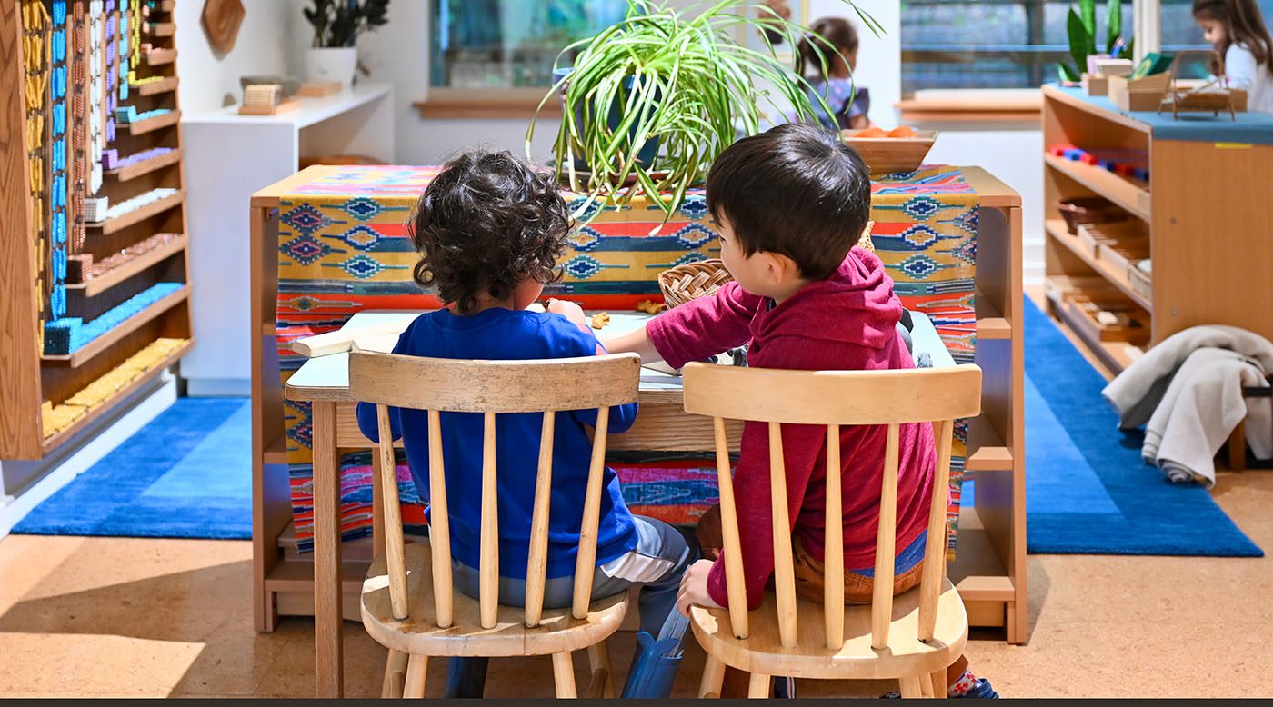 Two students reading side-by-side